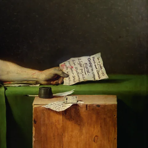 Marat assassiné/Musées royaux des Beaux-Arts de Belgique (Bruxelles At the centre are letters – between the documents, the plot of the painting is written (Credit: Marat assassiné/Musées royaux des Beaux-Arts de Belgique (Bruxelles)/J Geleyns)
